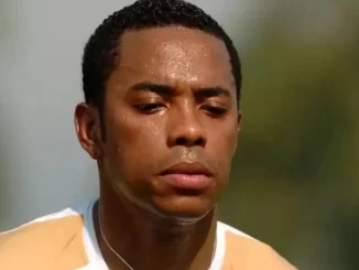 Imagem de Robinho com expressão triste, relacionado ao caso do STF mantendo sua prisão após confirmação da sentença italiana.