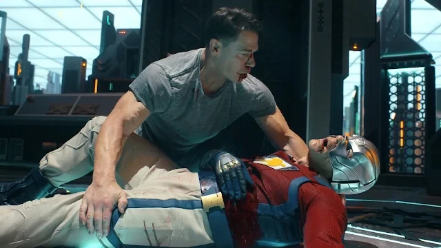 trailer-antecipa-cerco-argus-episodio-3-pacificador Trailer de 'Pacificador' mostra o cerco da A.R.G.U.S. no episódio 3, com cenas de ação e suspense envolvendo personagens em um ambiente futurista.