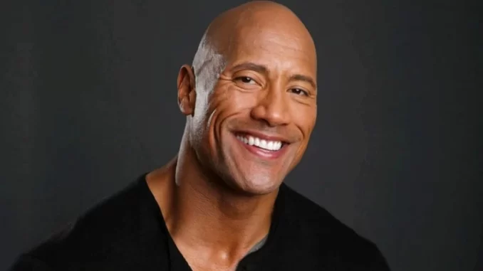 dwayne-johnson-coracao-de-lutador Dwayne Johnson interpreta um personagem robusto e carismático em uma cena do filme 'Coração de Lutador', destacando sua participação na trama de luta MMA.