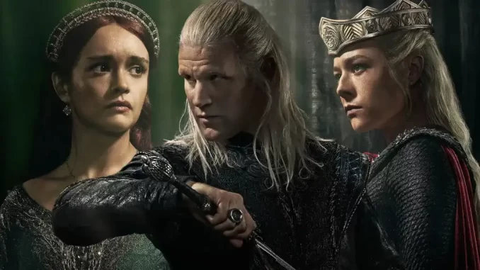 house-of-the-dragon-terceira-fase-batalha-estreia Cena da série House of the Dragon mostrando três personagens em episódio da terceira fase, com batalha inédita na estreia, destaque para vestidos e armas medievais.