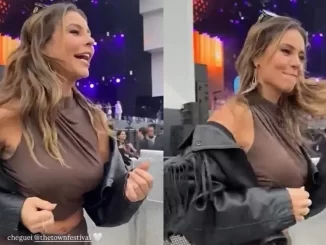 Paolla Oliveira exalta o desafio de Heleninha em 'Vale Tudo' durante participação no The Town, demonstrando entusiasmo e emoção no palco.