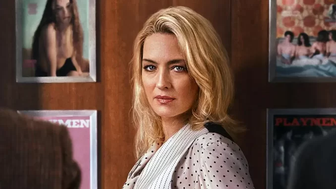 serie-italiana-sra-playmen-chega-netflix-12-de-novembro Cena da série italiana Sra. Playmen chegando à Netflix em 12 de novembro, com uma mulher com cabelo loiro e expressão séria em ambiente interno.