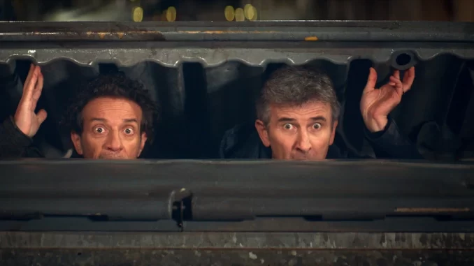 minisserie-expresso-sicilia-humor-natalino-fantasia-estreia-netflix Cena da minissérie Expresso Sicília com dois atores olhando de dentro de um trem, trazendo humor natalino e fantasia na estreia na Netflix.