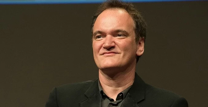 quentin-tarantino-declaracao-sionista-israel Cena de Quentin Tarantino, cineasta americano, em evento público, relacionado à sua declaração polêmica sobre morrer como sionista em Israel.