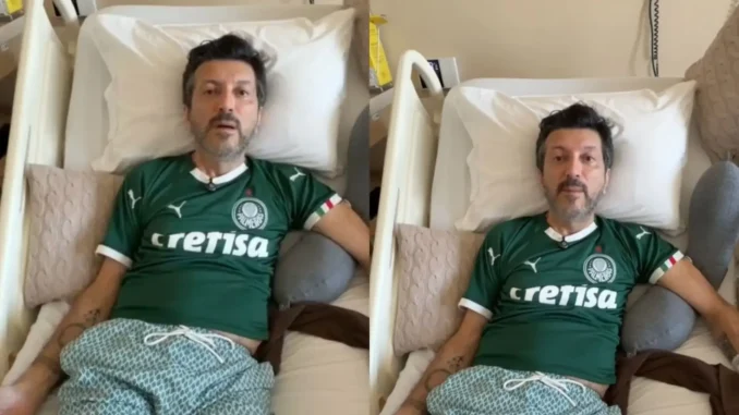 lito-souza-em-cama-camisa-palmeiras-doenca-de-creutzfeldt-jakob-tratamentos-rara Influenciador Lito Souza em foto sentado em uma cama, usando camisa verde do Palmeiras, enquanto recebe cuidados; destaque para a discussão sobre a Doença de Creutzfeldt-Jakob e busca por tratamentos para condição rara.